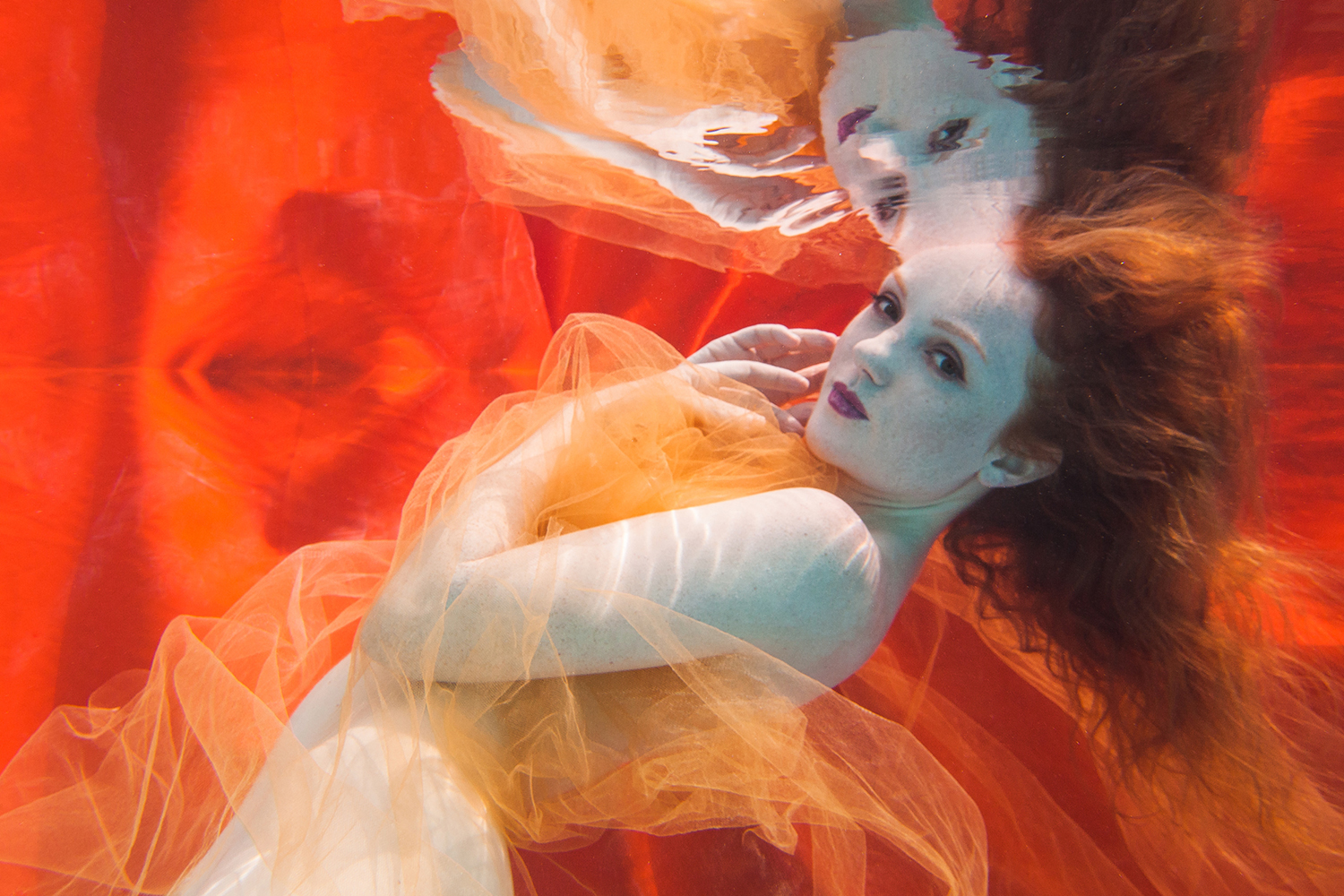 vory Flame redhead model underwater by photographer Chris Meredith