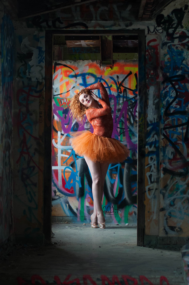 Redhead model with pale skin IVORY FLAME in ballet tutu graffiti urbex photoshoot with Rebecca Knowles Photography