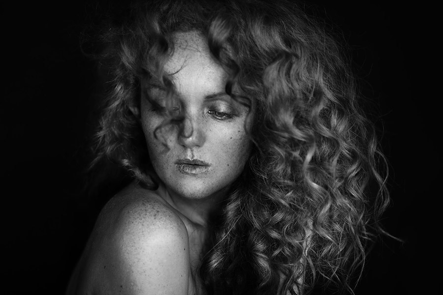 Portrait of art model Ivory Flame black and white with freckles by Nicole Luneberg