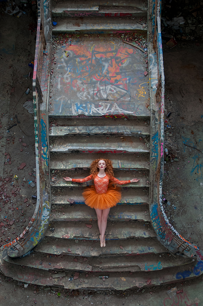 Red-haired model with pale skin IVORY FLAME in ballet tutu graffiti urbex photoshoot with Rebecca Knowles Photography