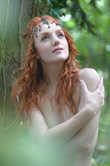 Redhead pre-raphaelite model Ivory Flame nymph in woodland, by Rebecca Knowles Photopgraphy