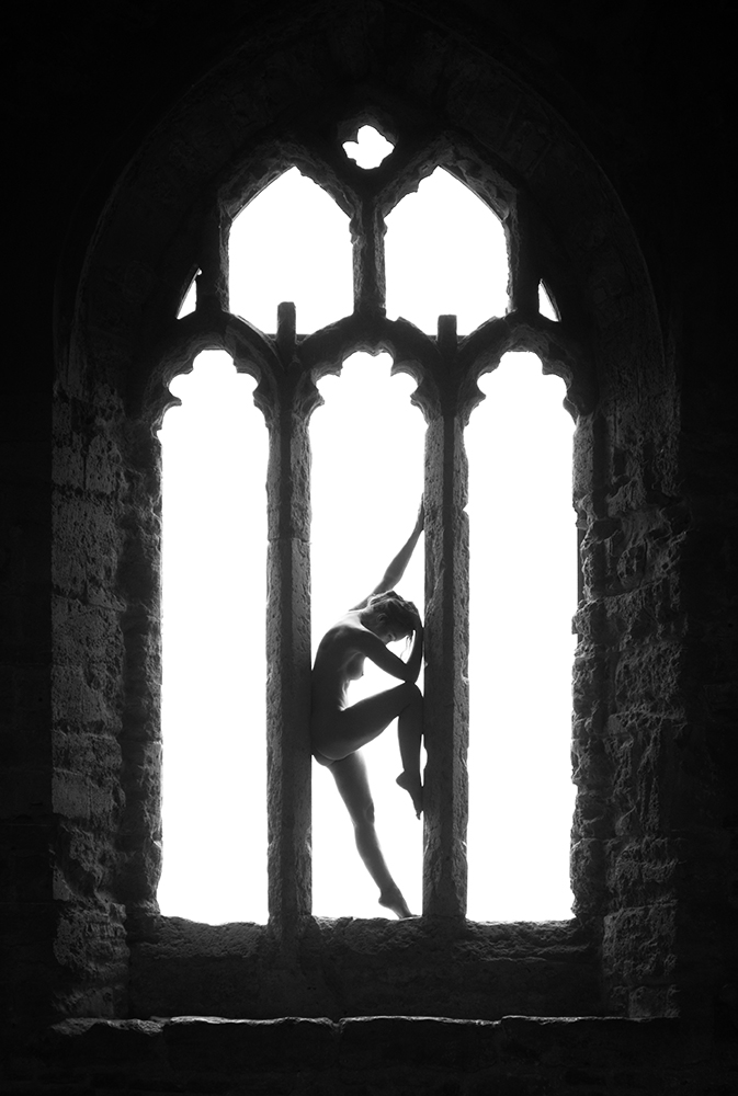 Fine Art Model IVORY FLAME silhouette in church window by Tim Pile